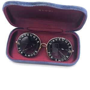 Gucci L’aveugle par amour sunglasses some minor sing of use.